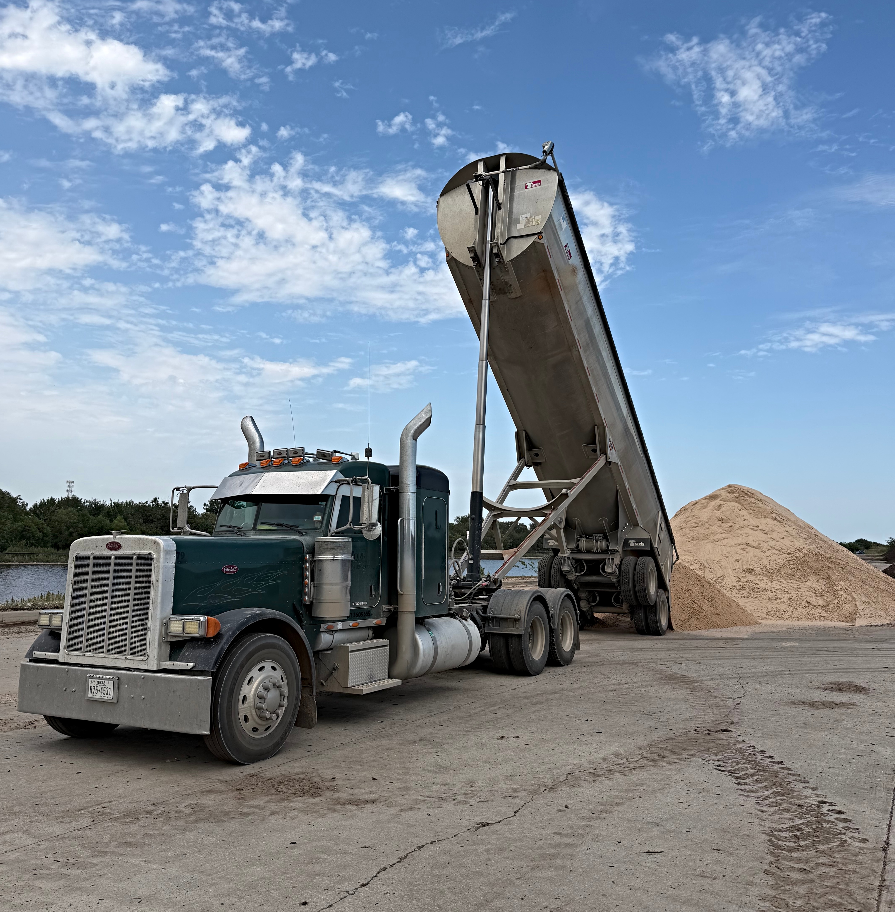 Peterbuilt dumping mason sand